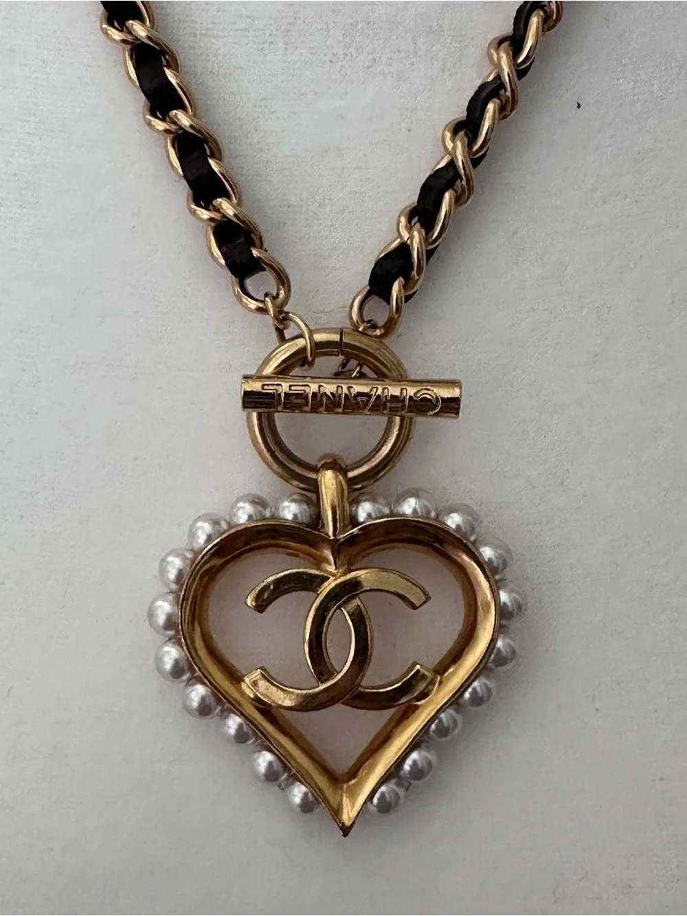CHANEL Gold and Black Heart CC Pendant Necklace with Pearls